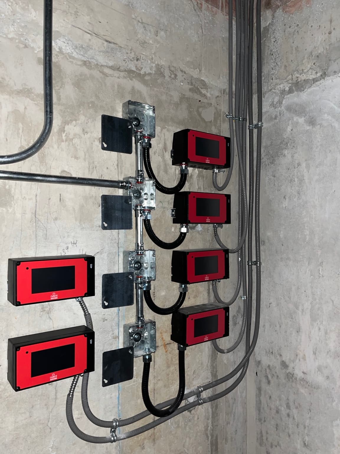 Raychem 465 heat trace controllers and conduit installed by Artech Electric.