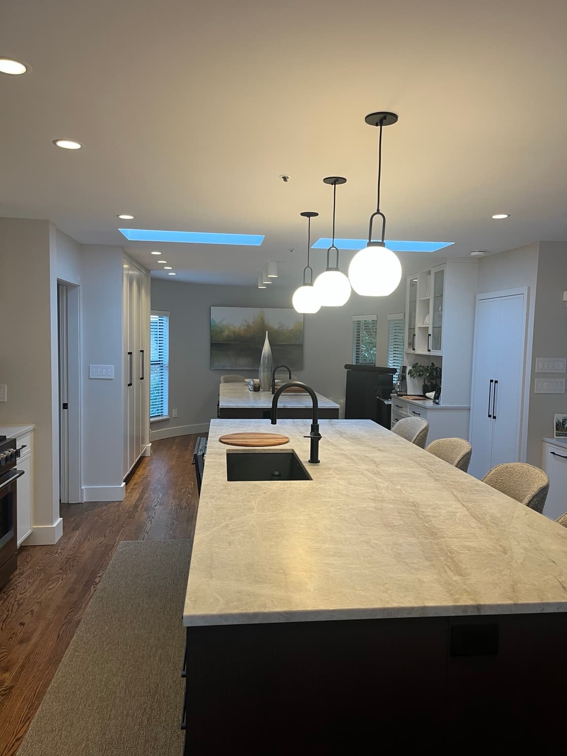 Residential kitchen lighting and electrical work by Artech Electric.